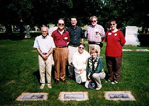 Members visiting Lewis's grave